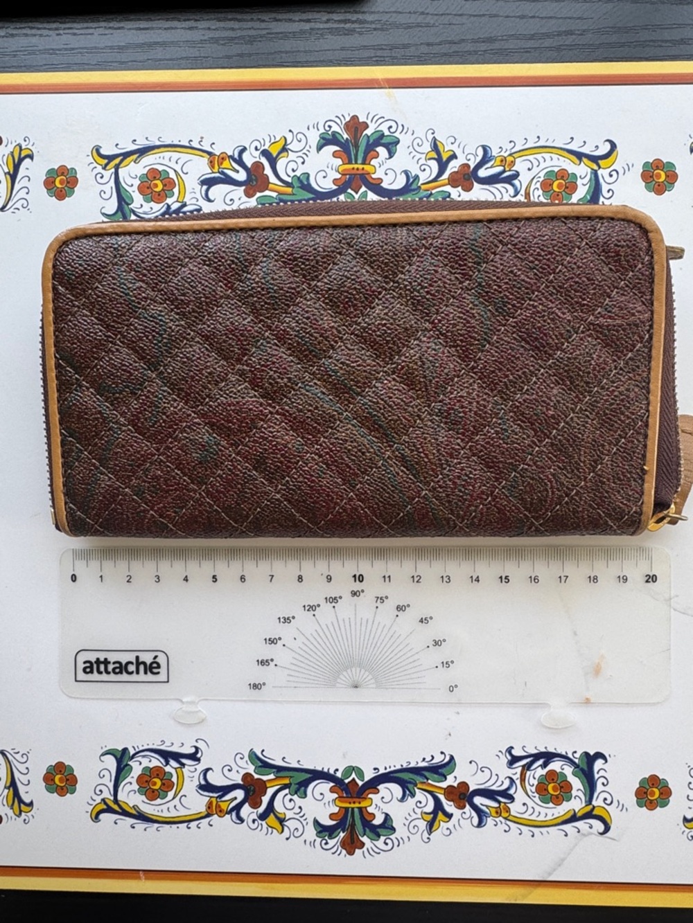 Authentic Etro zip-around wallet featuring signature paisley pattern.